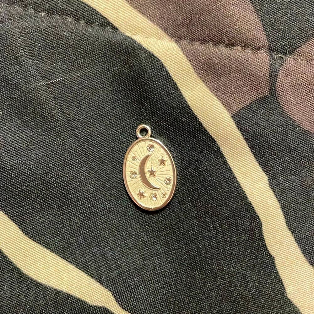 Beautiful moon pendant with ‘I love you’ engraved on the back.
